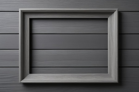 Gray frame hanging on wooden background wallの素材
