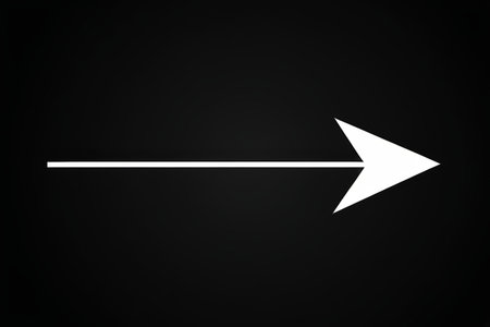 White arrow symbol on black backgroundの素材