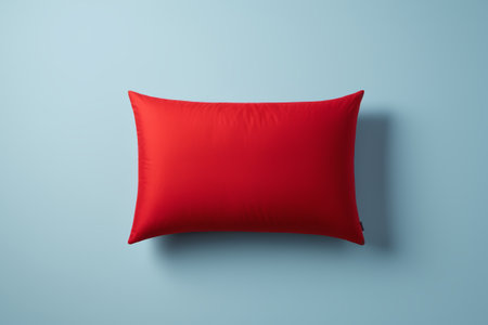 Red pillow on blue backgroundの素材