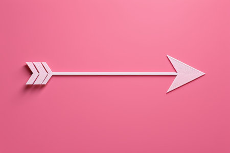 White arrow on pink backgroundの素材