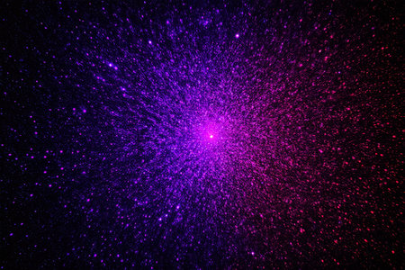 Purple glowing particles starry sky backgroundの素材