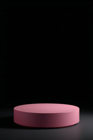 a close up of a pink round object on a black surfaceの素材