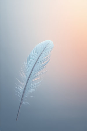 there is a white feather that is sitting on a tableの素材