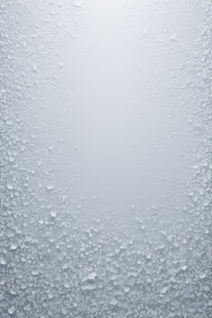 Close-up of water droplets on glass surfaceの素材