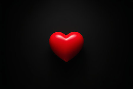 Red heart on black backgroundの素材