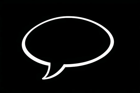 White dialog bubble icon on black backgroundの素材