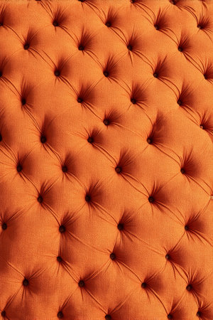Close-up of orange fabric decorative textureの素材