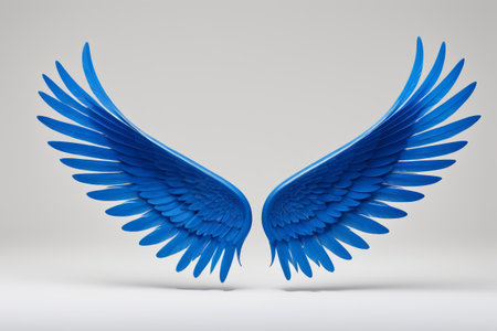 arafed blue wings on a white background with a shadowの素材
