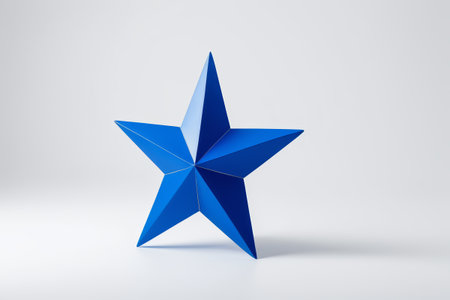 there is a blue star that is standing on a white surfaceの素材
