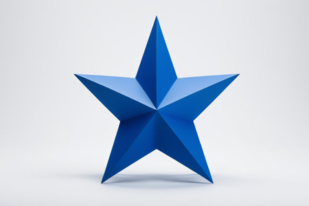 a close up of a blue star on a white surfaceの素材
