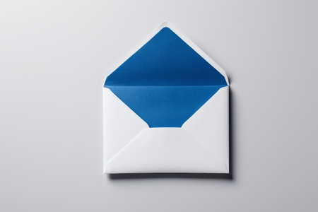 a close up of a white envelope with a blue envelopeの素材