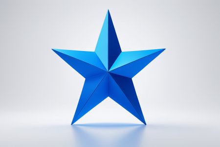 a close up of a blue star on a white surfaceの素材