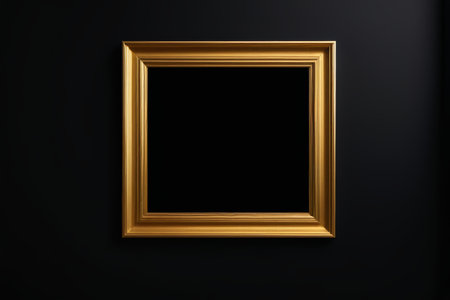 a close up of a gold frame on a black wallの素材
