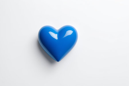 a close up of a blue heart shaped object on a white surfaceの素材
