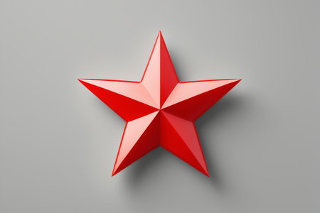 a close up of a red star on a gray surfaceの素材
