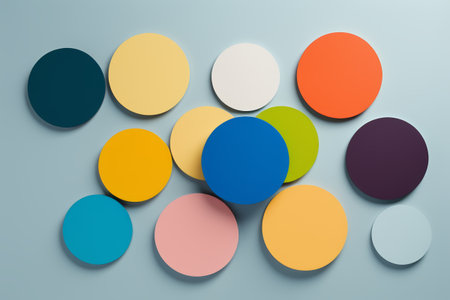 arafed circles of different colors are arranged on a gray surfaceの素材