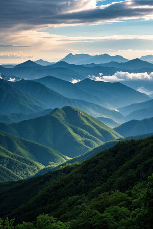 Panoramic view of the natural scenery of the continuous mountainsの素材