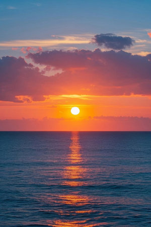 Sunset at sea and cloud scene in the skyの素材