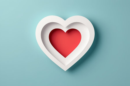White heart nested in red heart on blue backgroundの素材