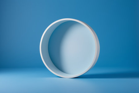 White ring-shaped object on blue backgroundの素材