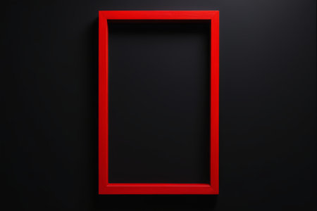 Red empty photo frame on black backgroundの素材