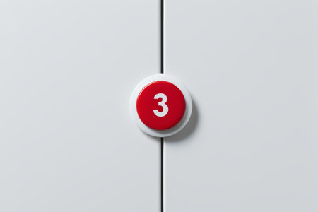 Red button with the number 3 on a white backgroundの素材