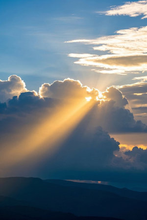 Natural scenery where sunlight penetrates the cloudsの素材