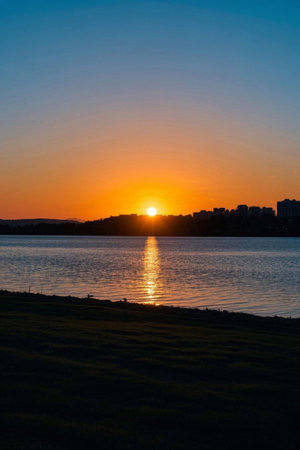 Sunset city view by the lakeの素材