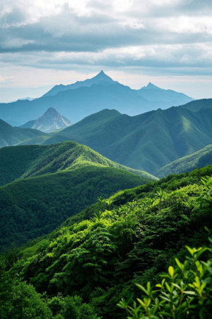 Green natural scenery with rolling mountainsの素材