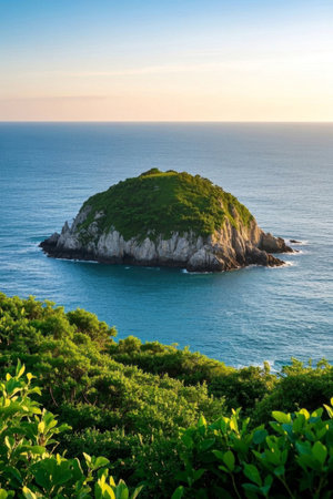 Island at sea and green landscape on the shoreの素材