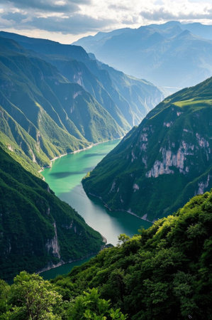 Canyon scenery with green mountains and green waterの素材