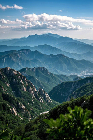 Outdoor continuous mountains and blue sky and white clouds landscapeの素材