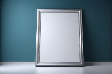 Silver blank picture frame placed against the wallの素材