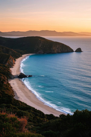 Beach and mountain and sea views at duskの素材