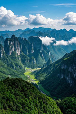 Landscape of the valley between green mountains and sea of cloudsの素材