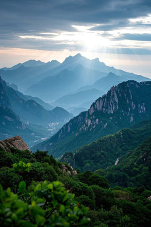 Mountain sun penetrates clouds and sceneryの素材