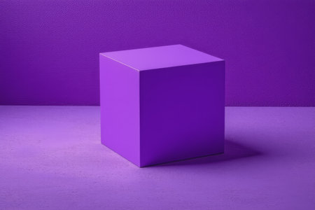 Solid geometric cube on purple backgroundの素材