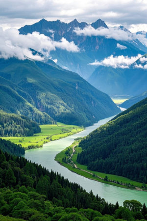 River and green mountain scenery between valleysの素材
