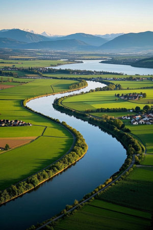 Aerial view of rural rivers and distant mountainsの素材