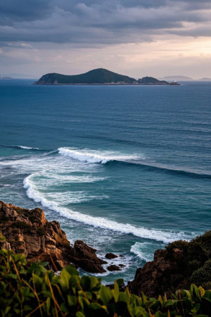 Seaside rocks and distant island sceneryの素材