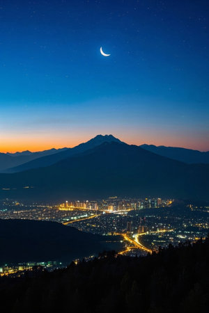 City night view and distant mountain starry sky panoramaの素材