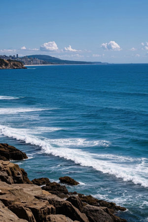 Seaside rocks and blue ocean sceneryの素材