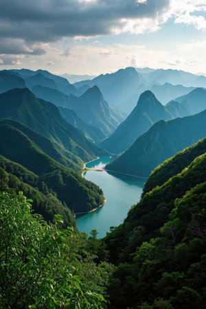 Panoramic view of natural scenery with green mountains and green watersの素材
