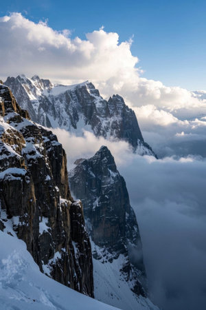 Magnificent scenery of snow capped mountains and sea of cloudsの素材