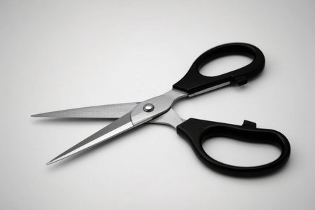 Close up of black handle metal scissorsの素材