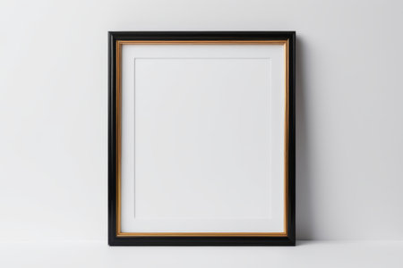 Black gold rimmed photo frame displays a blank imageの素材