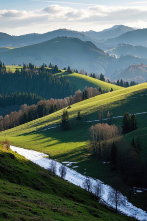 Panoramic view of natural scenery with green mountains and green treesの素材