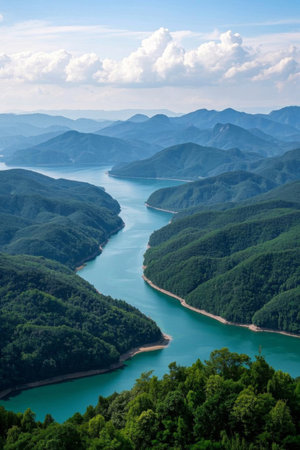 Lake scenery with green mountains and green waterの素材