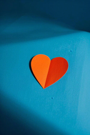 Two color heart on blue backgroundの素材