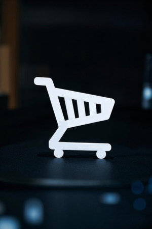 White shopping cart icon close upの素材